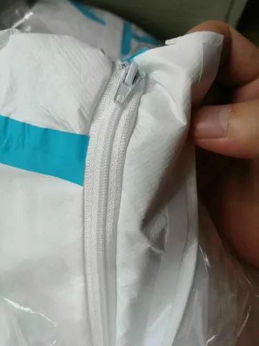 Jednorázový ochranný kombinéz XL | Kombinéz | Bíly 0